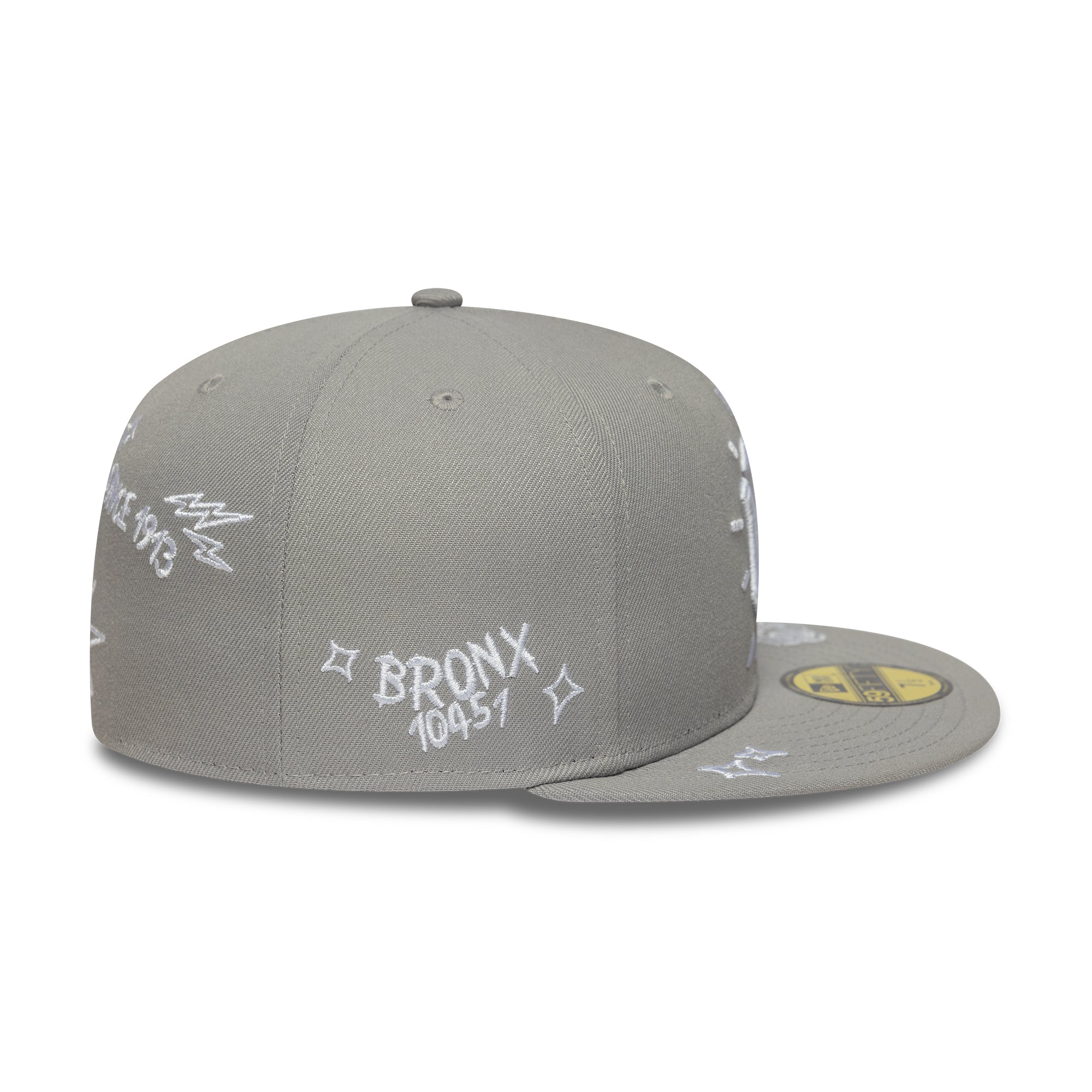 Grå New Era 59FIFTY Yankees cap med scribble-udtryk og flat kasket, perfekt til baseballfans og samlere