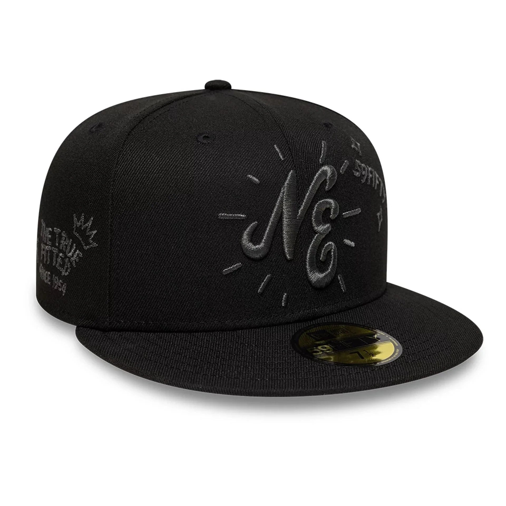 Sort New Era 59FIFTY fitted cap med NE-SCRIBBLE print, klassisk baseballkasket med flat top og justerbar rem.