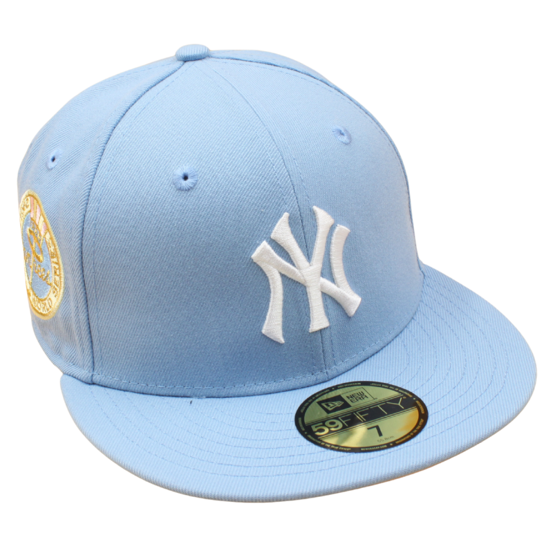 New Era 59FIFTY Yankees World Series 1962 cap i Birdseye Blue og pink UV, med flat top og justerbar skygge.