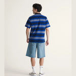 VANS check-5 baggy denim shorts i stenvasket blå farve med løse pasform og klassisk denim look.