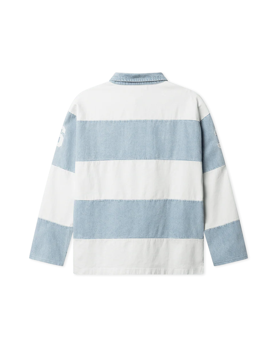 BLS denim polo i vaskeblåt med rund hals og lange ærmer, lavet af blødt bomuldsstof.