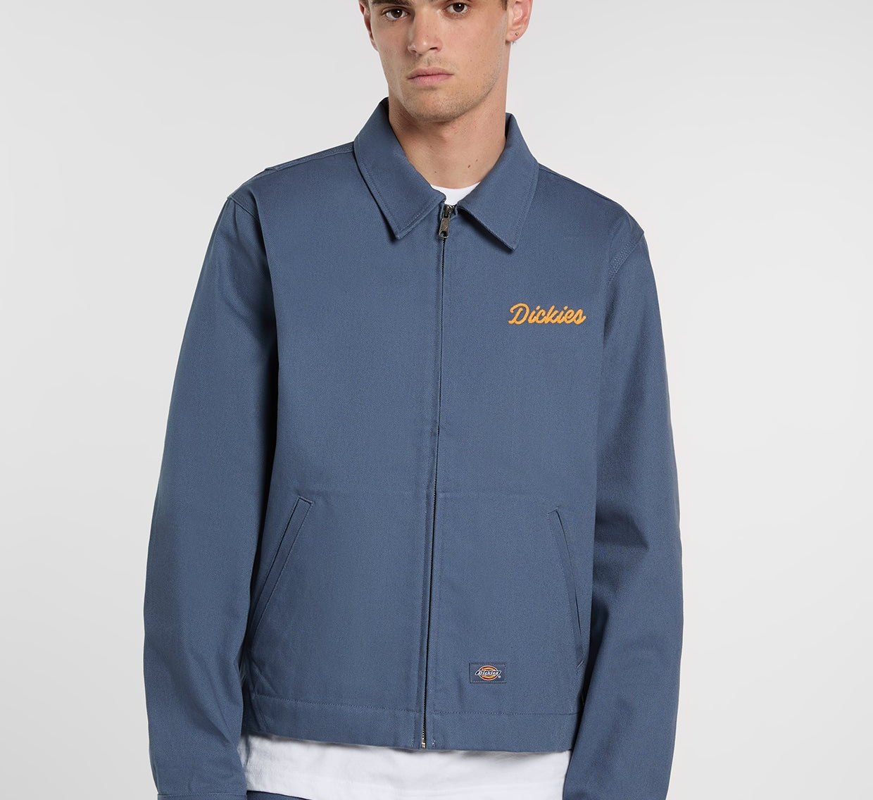 Dickies Wellsville retro jakke i indigo stof, vises med klassisk design og detaljer.