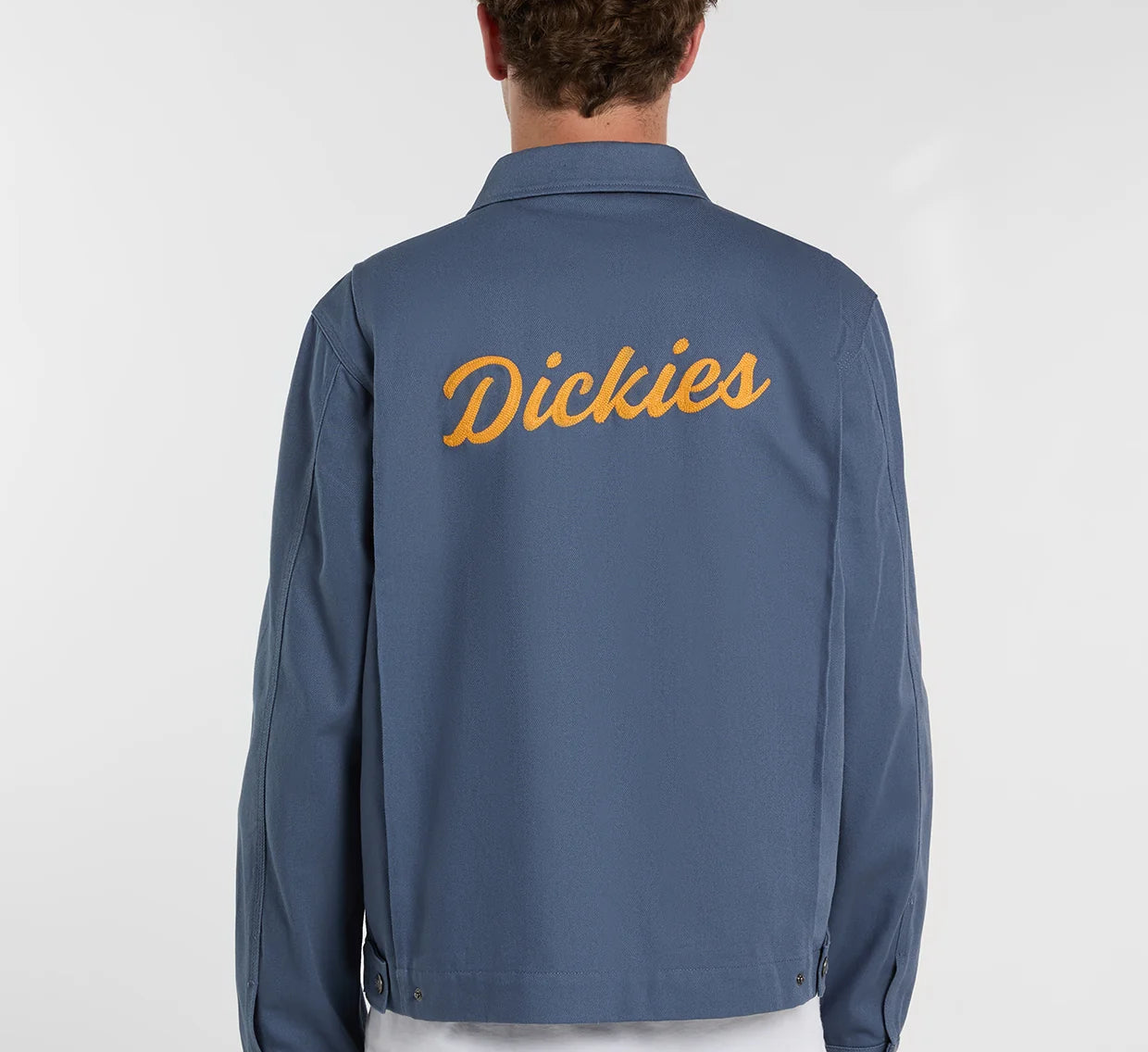 Dickies Wellsville jakke i retro indigo, blød bomuldsjakke med klassisk design og synlige syninger, foran og ærmer.