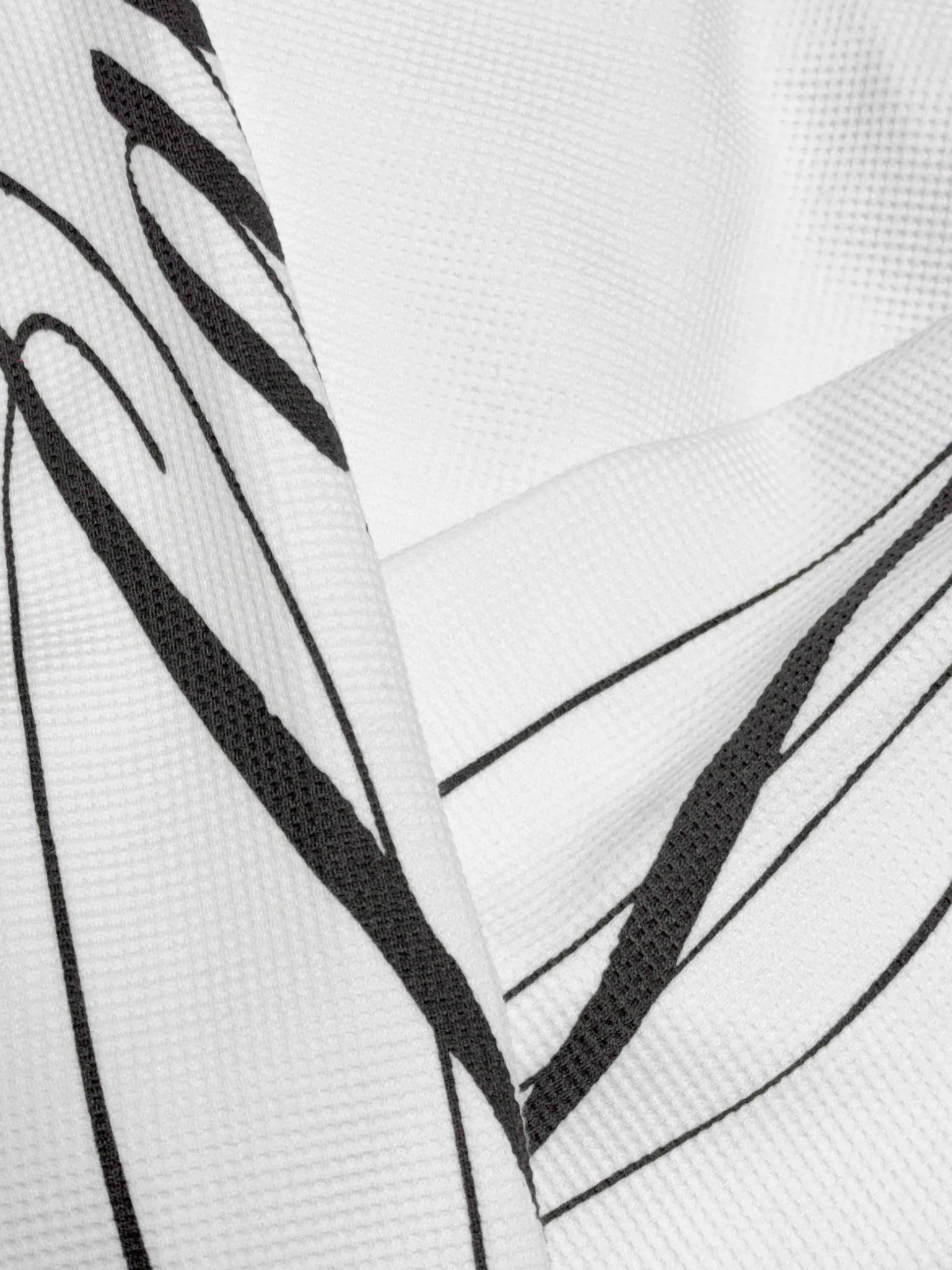 Hvid Lau Lau T-shirt med loopvaffel-design og lange ærmer, afslappet og stilfuldt tøj til daglig brug.