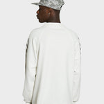 Hvid Lau Lau T-shirt med loop waffle LS TEE-design, afslappet pasform og blødt bomuldsstof, vist på model.