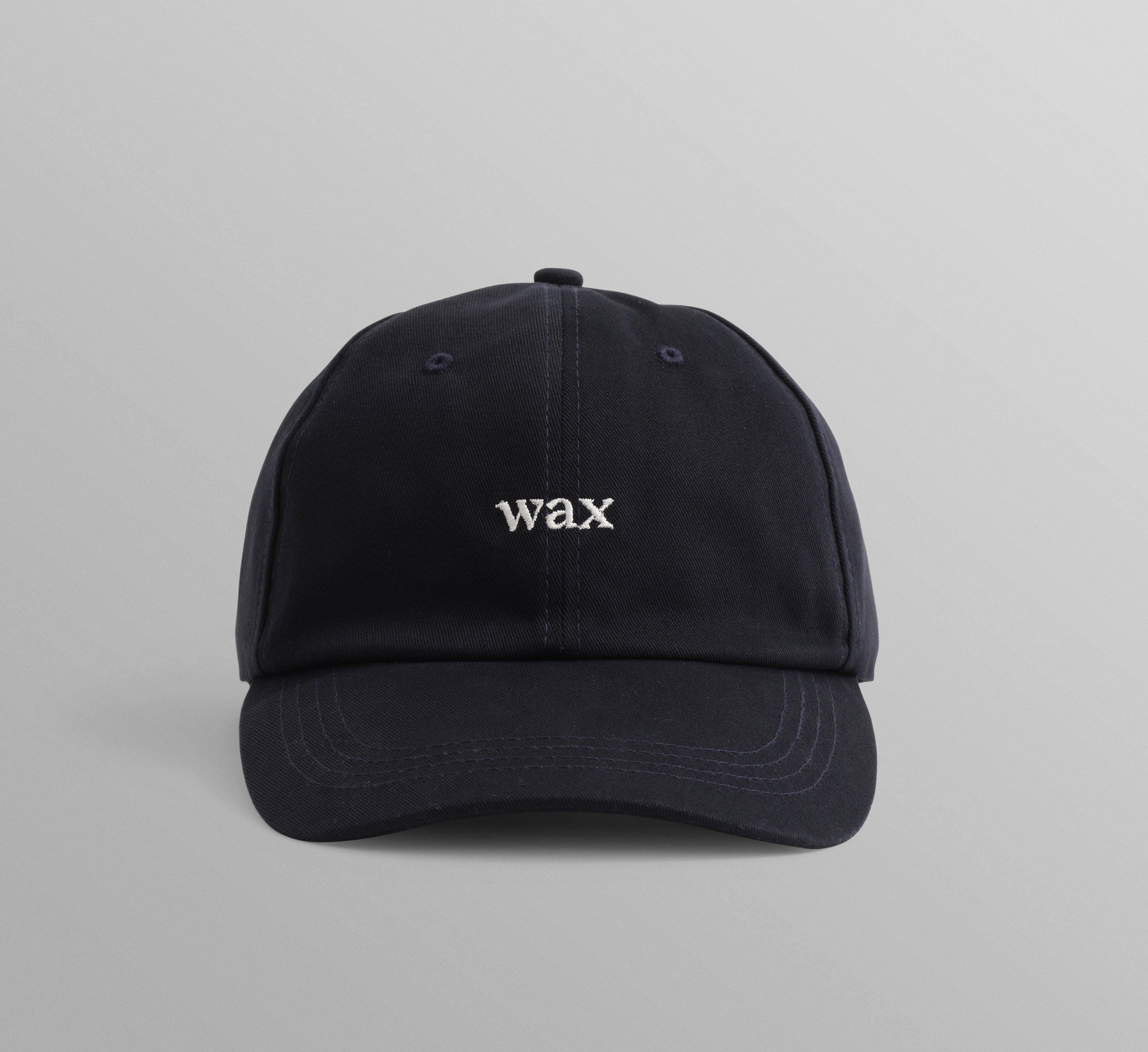 Navy Spencer sport cap fra Wax London med bomuld, afslappet stil og sportsinspireret design, synlig i billedet