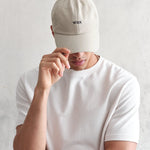 Sports cap i stenfarvet bomuld fra Wax London med justerbart bånd og afslappet stil.