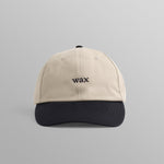 WAX London Spencer sportkasket i stenfarvet og navy bomuld med justerbart bånd og sportslig design.
