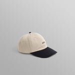 Mørkeblå bomuldsportskasket fra Wax London, Spencer Sport Cap i stenfarvet og navy farve, afslappet og stilfuldt hovedbeklædning