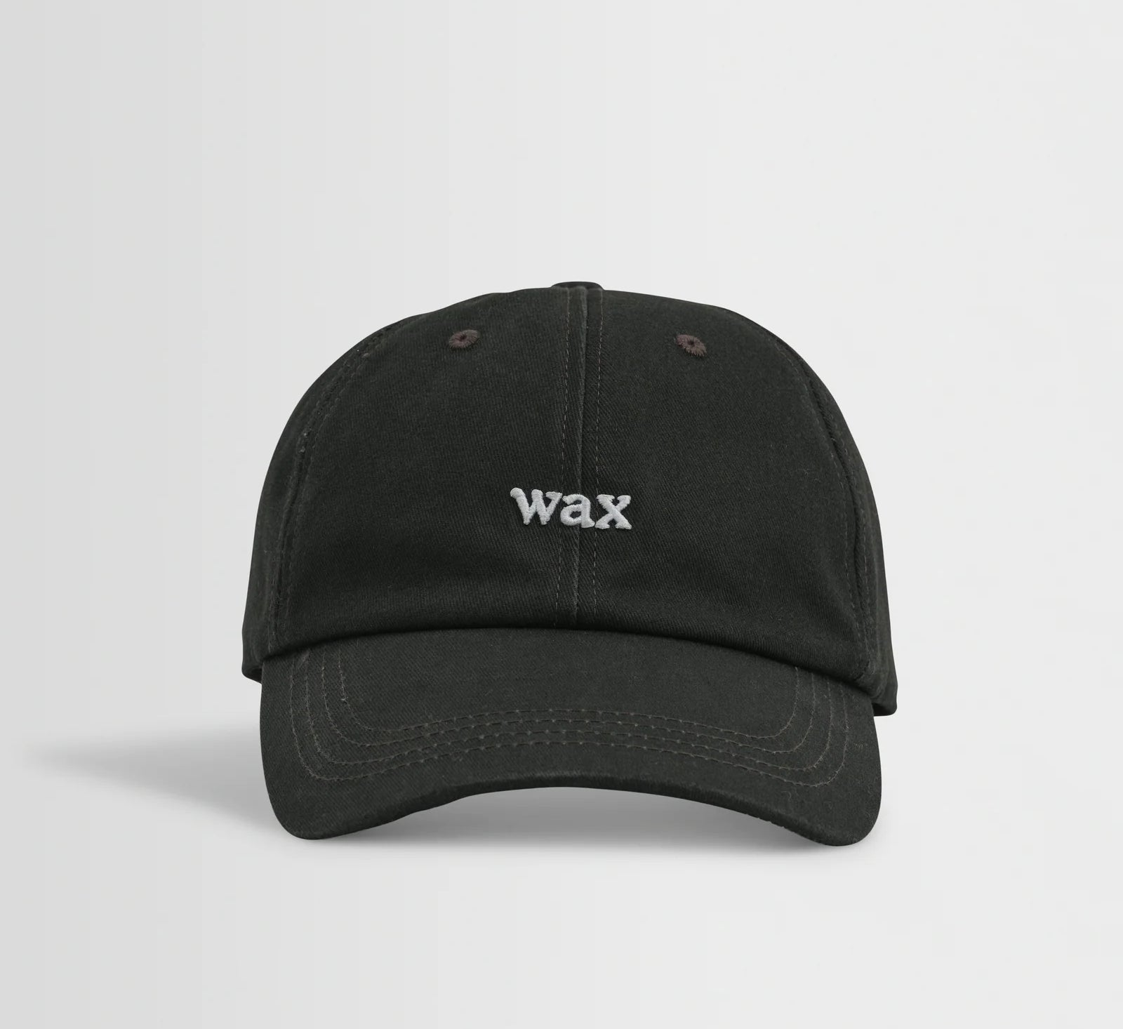 Sort Spencer sport cap fra Wax London i vaskede bomuldsmaterialer, afslappet og sporty design med justerbart bånd.