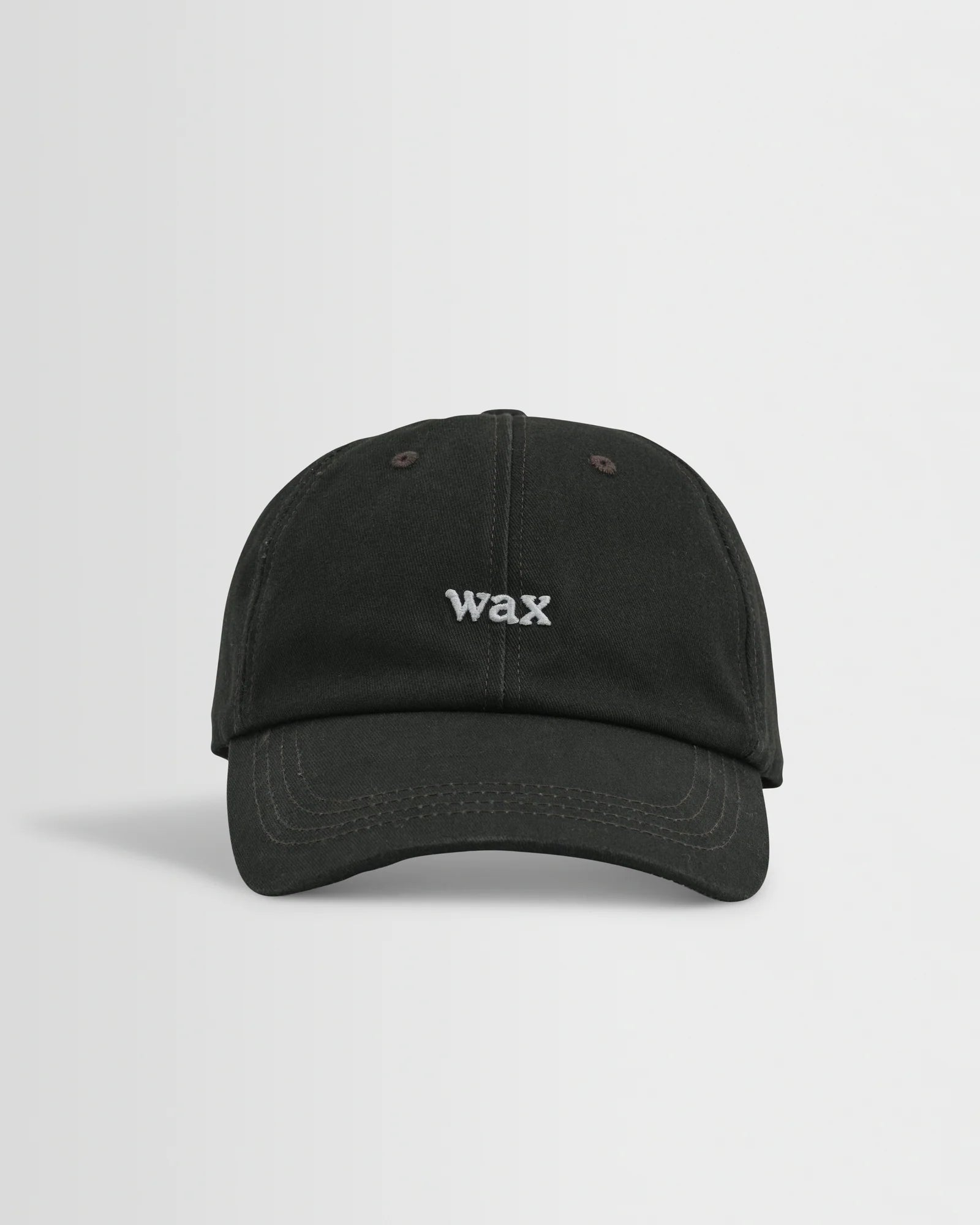 Sort Spencer sport cap fra Wax London i vaskede bomuldsmaterialer, afslappet og sporty design med justerbart bånd.